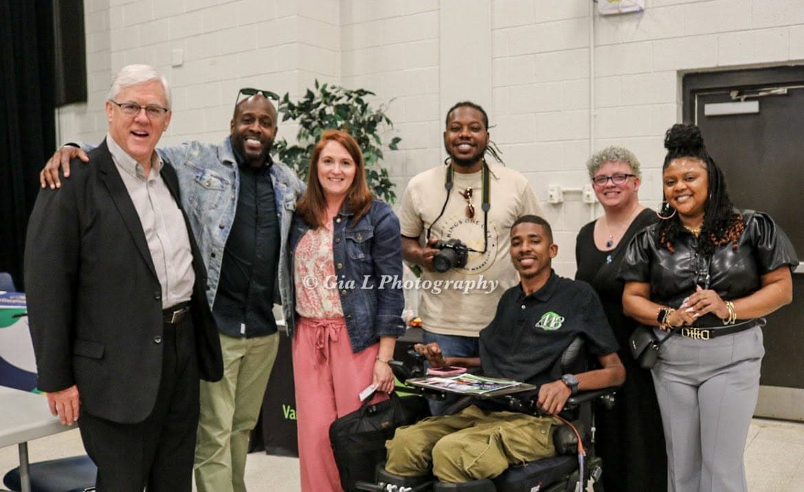 CJ with community leaders and partners at a Henderson event