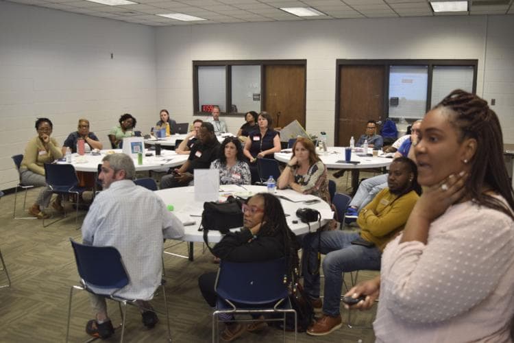 Data-to-Action Workshop in session — facilitator presenting to participants